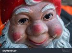 stock-photo-face-of-old-gnome-close-up-of-a-garden-gnome-1295009125.jpg