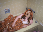 Helga eating in the bath.png