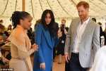 4435972-6190869-Meghan_Markle_centre_pictured_with_her_mother_Doria_Ragland_took-a-1_153747742...jpg